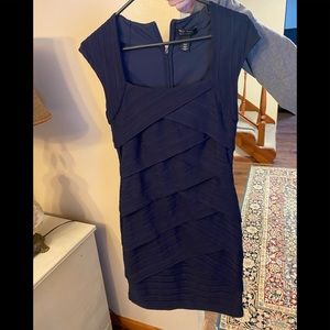Navy blue dress.   Fitted in a great way!!!